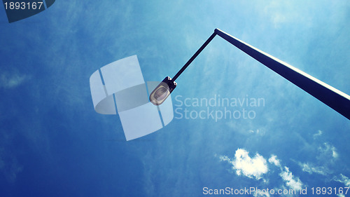 Image of street light with blue sky