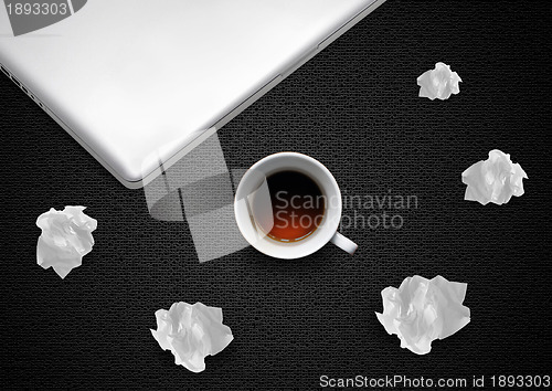 Image of Crumpled papers and coffee