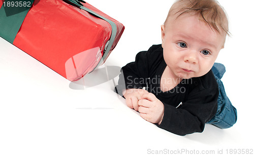 Image of Christmas present and beautiful baby boy