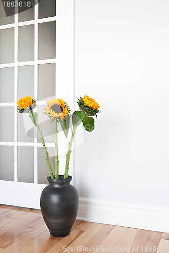 Image of Sunflowers decorating a room