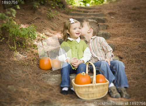 Image of Brother and Sister Children on Wood Steps with Pumpkins Whisperi