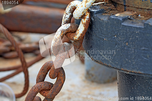 Image of aging anchor chain on ancient nave