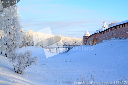 Image of aging brick fortress on snow hill