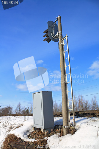 Image of railway semaphore on blue background