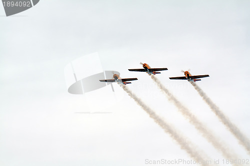 Image of three planes in cloudy sky