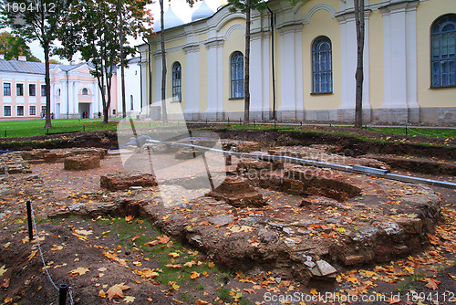 Image of history excavations near old-time building