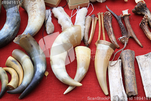 Image of caucasian souvenirs on red table