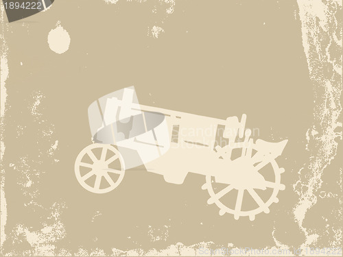 Image of old tractor on grunge background