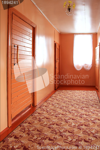 Image of light corridor in rural wooden house