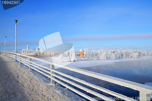 Image of pedestrian bridge through greater river