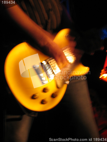 Image of playing guitar