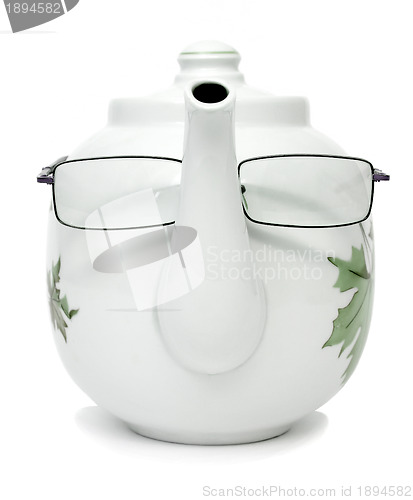 Image of Porcelain teapot with glasses