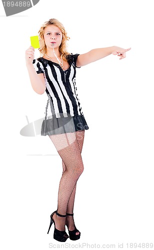 Image of Attractive referee showing yellow card