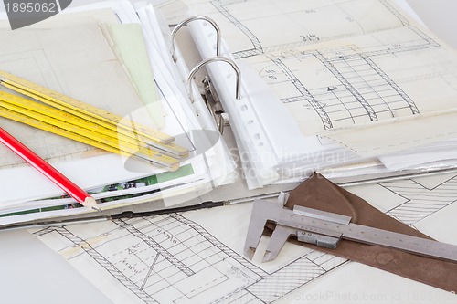 Image of Architectural plans of the old paper measuring tools and file with the project