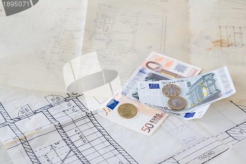 Image of Architectural plans and euro money
