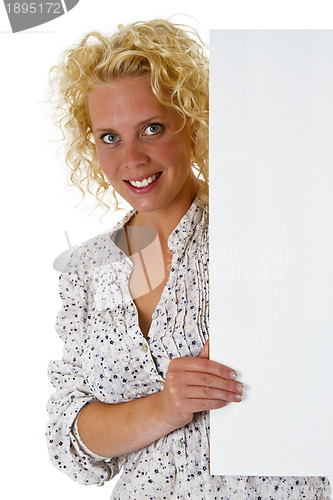 Image of Beautiful woman holding a blank message board