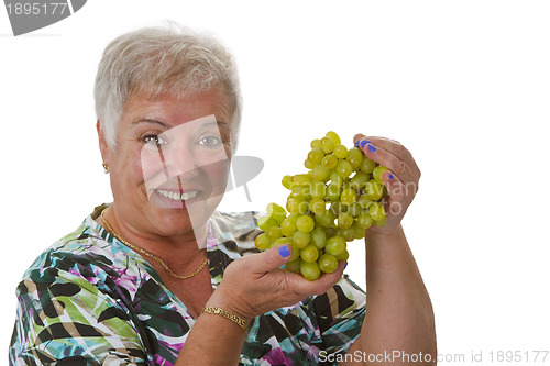 Image of Female senior with grapes 