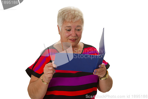 Image of Senior female looking  at statement of account