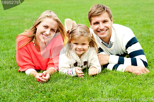 Image of Portrait of a happy family of three