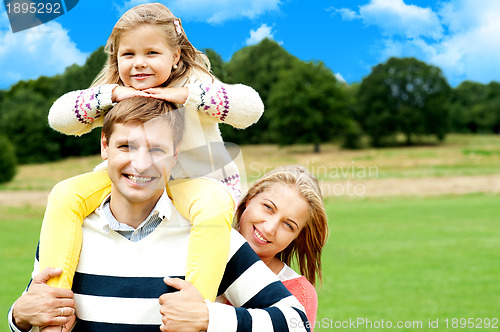 Image of Happy smiling family outdoors