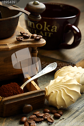 Image of Coffee grinder and marshmallows.