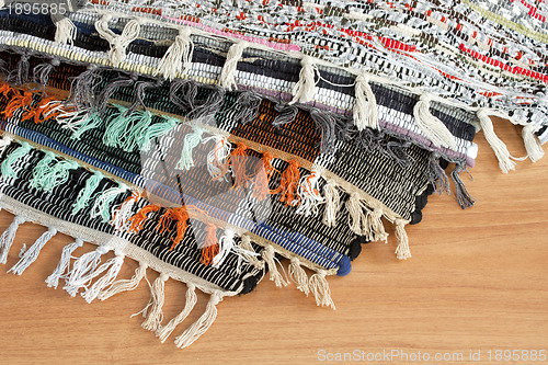 Image of Homespun mat of colored ribbons