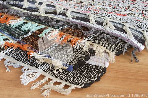 Image of Homespun mat of colored ribbons