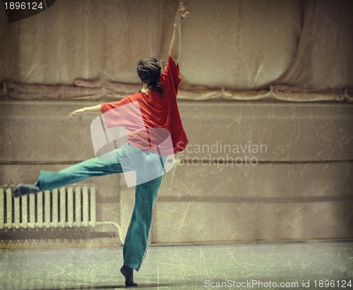 Image of Young woman doing ballet