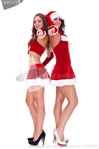 Image of two sexy santa women pointing