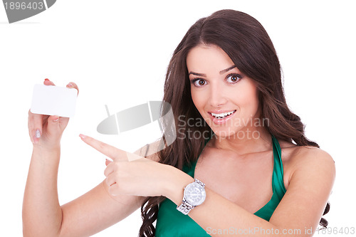 Image of woman pointing at blank card 