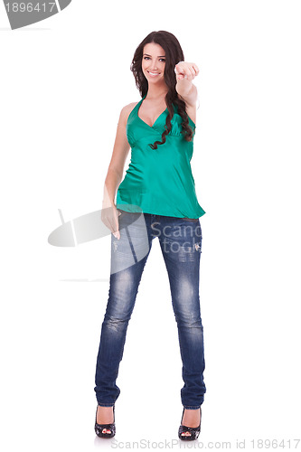 Image of woman in casual clothes, pointing