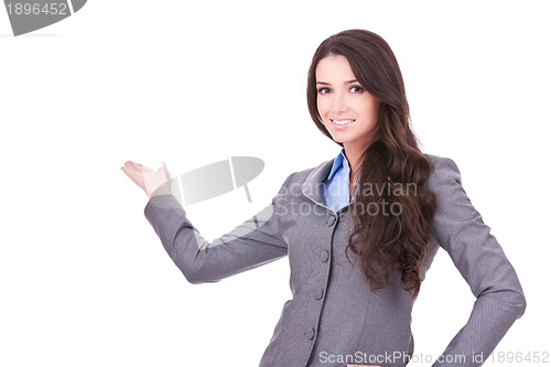 Image of woman with her arm out in a welcoming