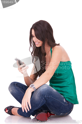 Image of woman sending an sms