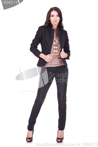 Image of casual woman pulling her jacket