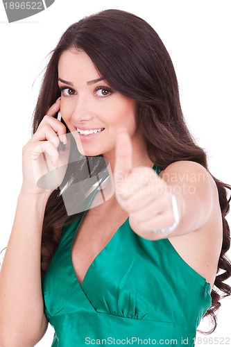 Image of woman with phone and ok gesture