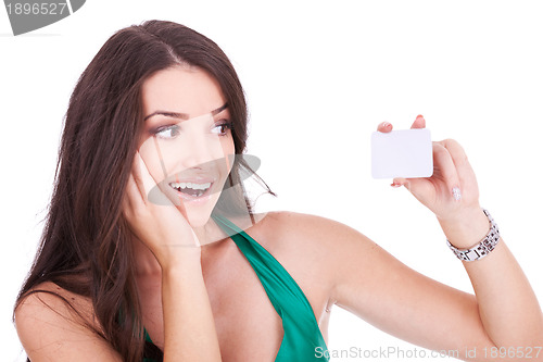 Image of woman looking at her bussiness card 