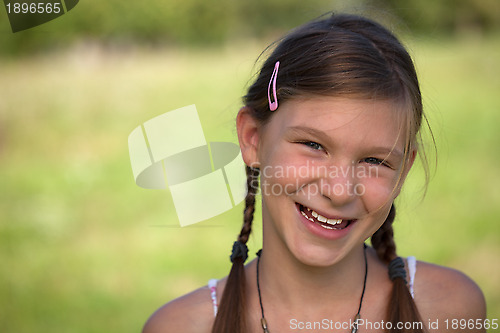 Image of Portrait of a smiling young girl