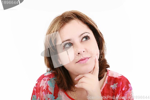 Image of Closeup of an attractive young woman thinking, isolated on white