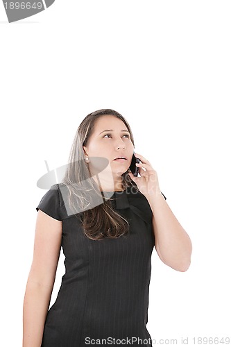 Image of Woman employee speaking mobile phone 