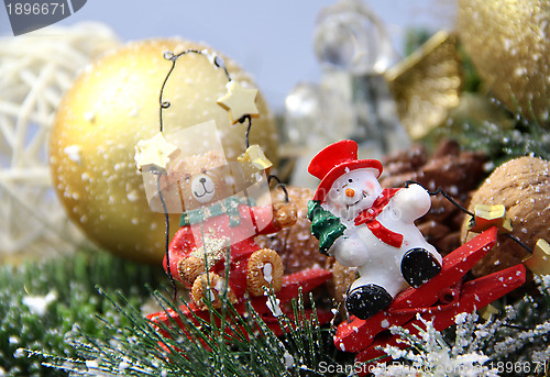 Image of Christmas decorations bear and snowman 	 