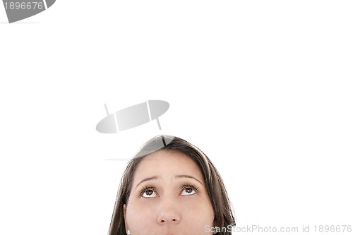 Image of Closeup portrait of a young woman looking up isolated on white b