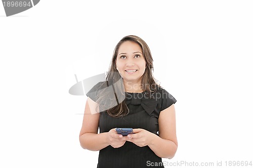 Image of Portrait of happy young business woman text messaging on mobile 