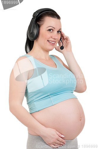 Image of Pregnant with headphones