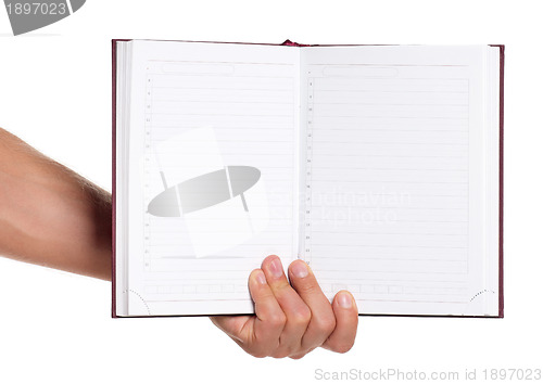 Image of Man hand with notebook