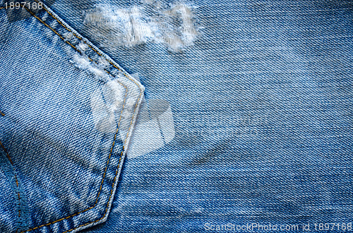 Image of blue jeans pocket closeup texture  