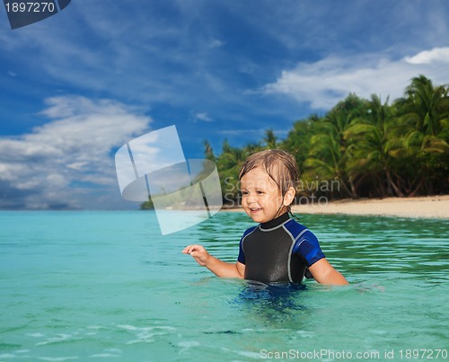 Image of Little boy in the wetsuit