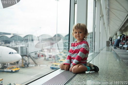 Image of happy little kid in airport