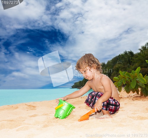 Image of Kid playing on the seashore