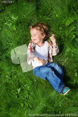 Image of funniest kid rolling on grass