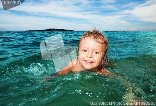 Image of Kid swimming in the sea